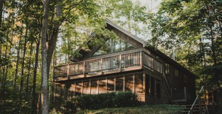 when to restain log cabin